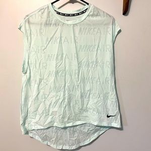 Light aqua blue Nike tank top.